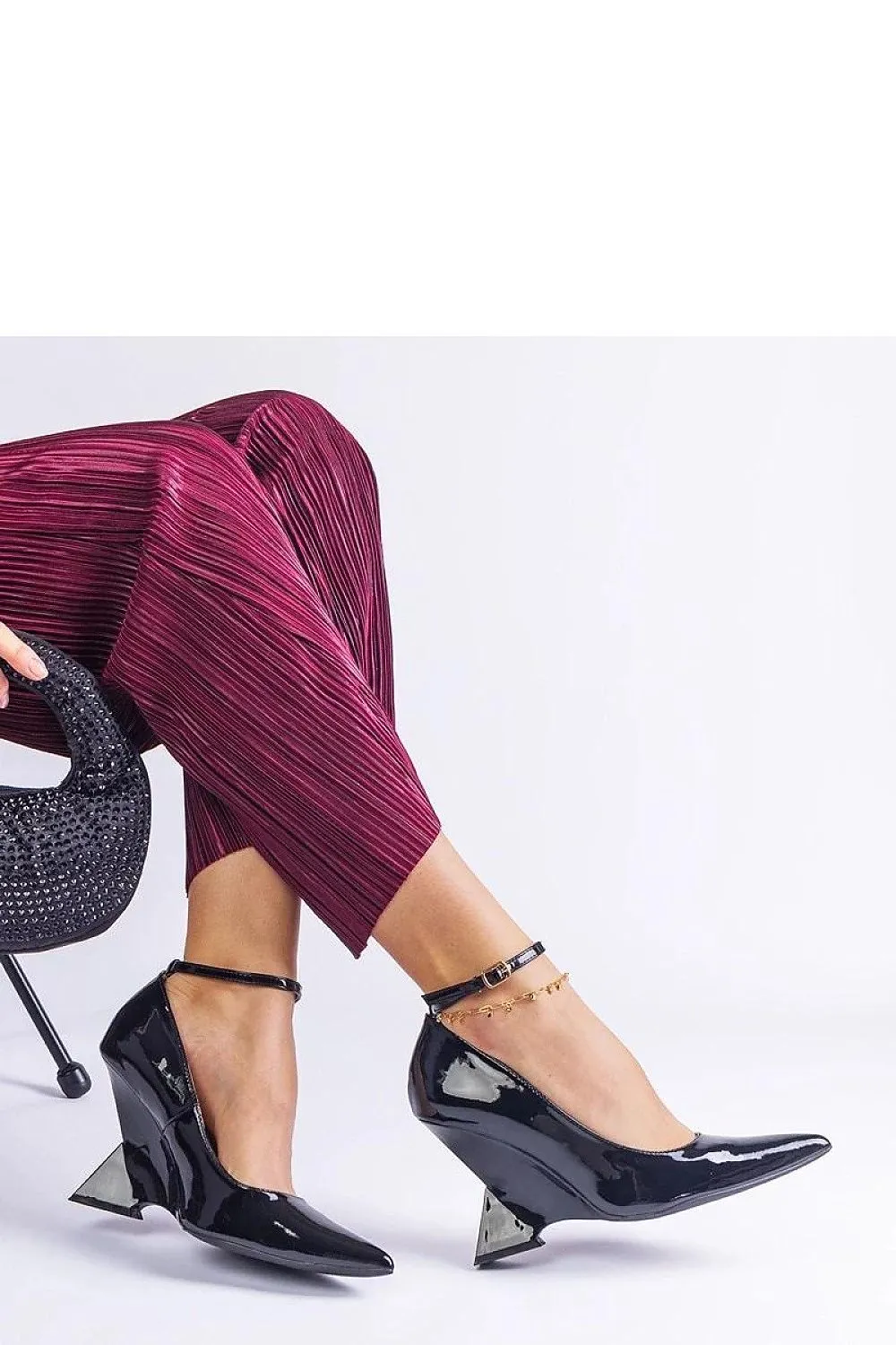 Red patent leather wedge pumps