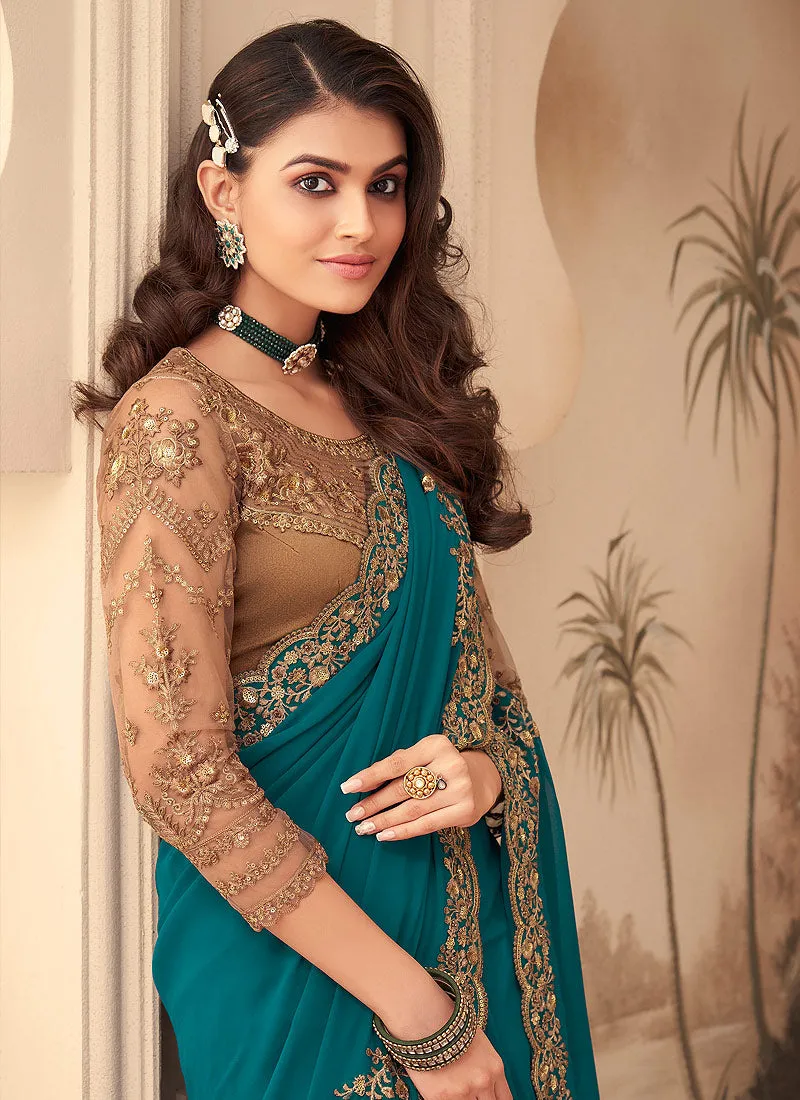 Turquoise And Gold Embroidered Party Wear Georgette Saree